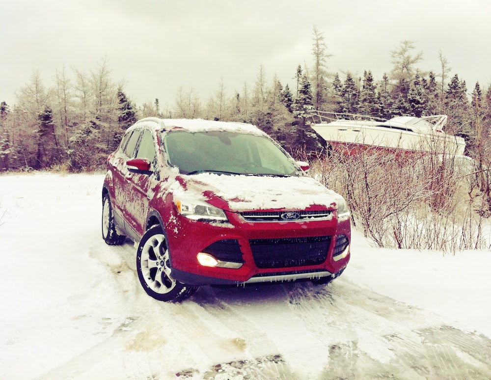 This is an example of a bad car picture; you can't fully see what it looks like because of the snow on the hood and roof.